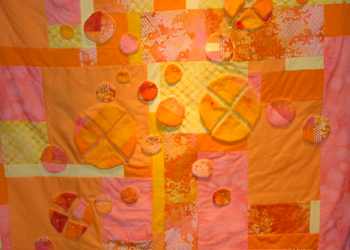 Oranges and pinks, circles and quartered circles on the background