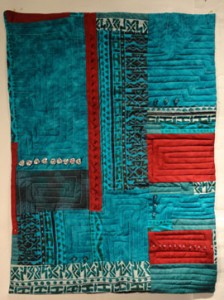 quilt using the DMC colors plus one more turquoise with beads