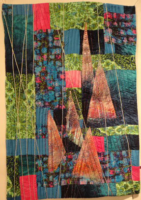 Full shot of the quilt showing the angelina and matalic cords