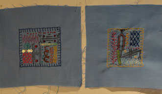Two more blue blocks with various colored embrodery thread